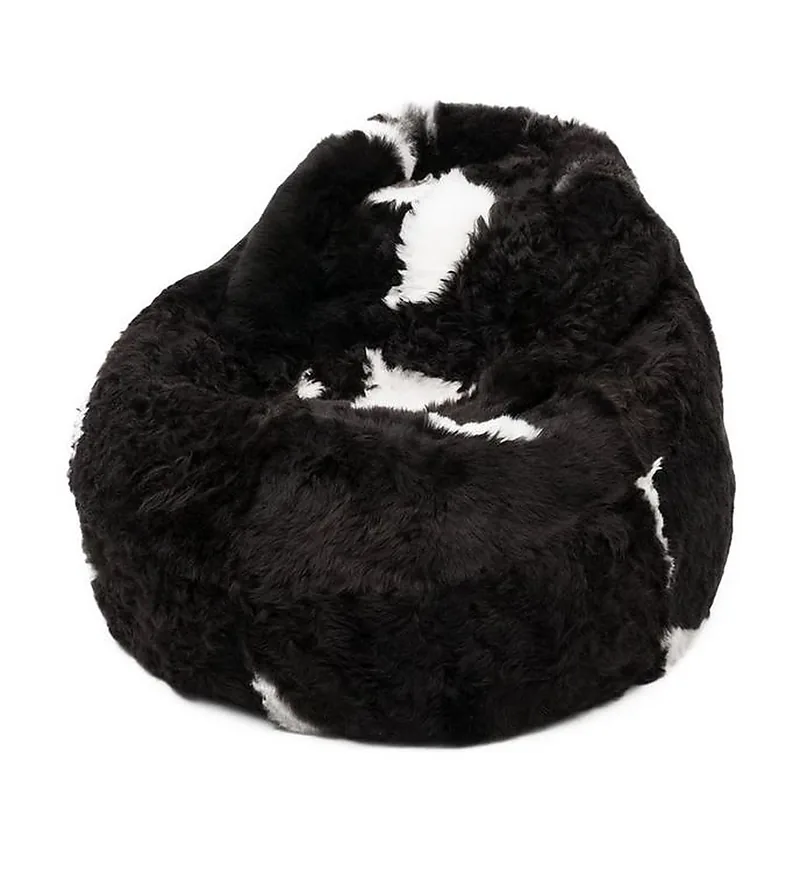 Pouf Coussin Peau de Mouton Islande Poils Courts - Noir Taches Blanches