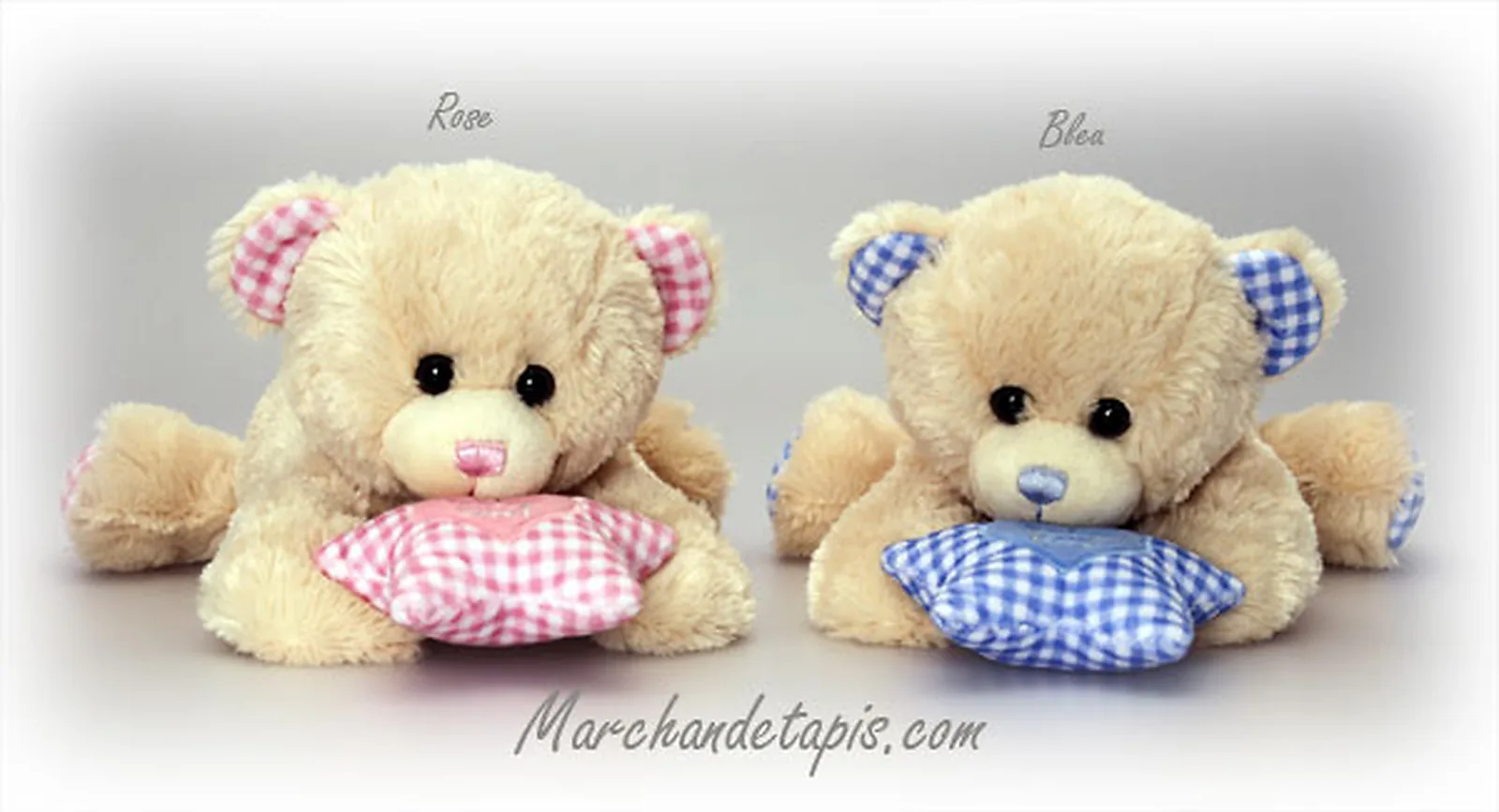 Peluche petit ours couché musical, bleu.