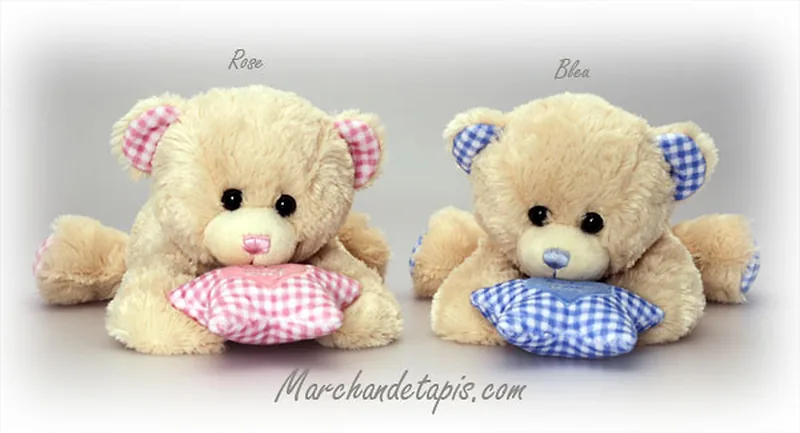 Peluche petit ours couché musical, bleu.